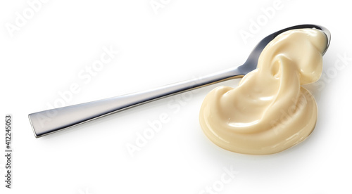 Spoonful of creamy homemade mayonnaise photo