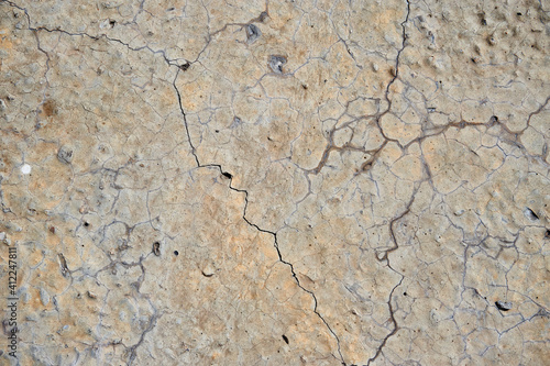 Concrete wall with shallow cracks