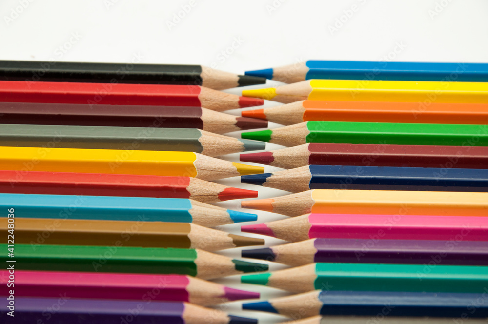 colored pencils on a white background. education concept. illustration of training. colored pencils on a white background. education concept. illustration of training.