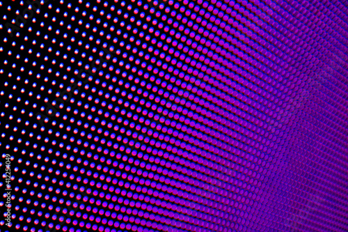 Dotted gradient background with pink, blue and purple tones