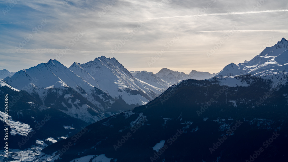 view to the alps, the hohe tauern  in austria, with sahara dust in the athmosphere on a sunny winter day