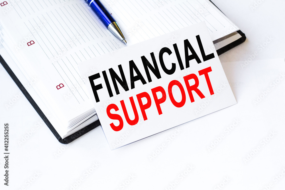Text FINANCING SUPPORT on financial tables, the working paper . Business and financial conzept.