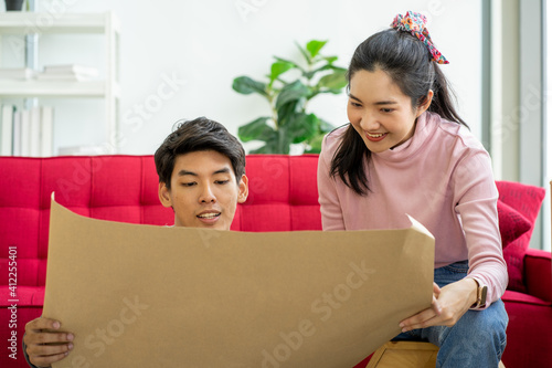 Asian couple lover moving into new house 