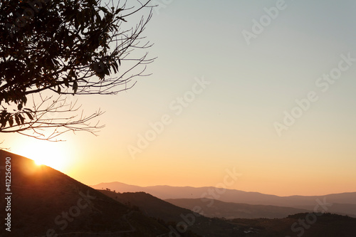 Panoramic view of hills at sunset photo
