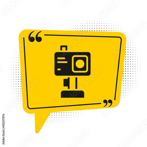 Black Action extreme camera icon isolated on white background. Video camera equipment for filming extreme sports. Yellow speech bubble symbol. Vector.