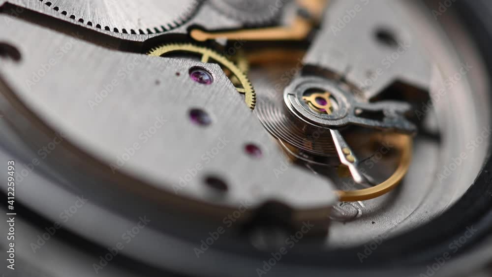 Working gear mechanism of an old wrist watch in macro. Close-up Working gear mechanism of an old wrist watch in macro. Close-up