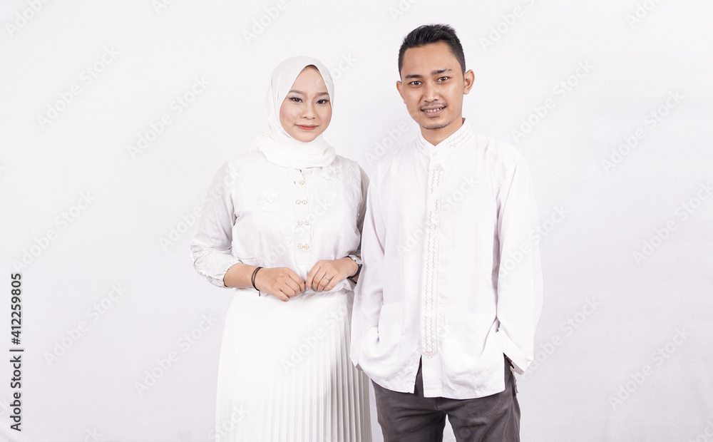 Asian moslem couple wearing moslem clothes Asian moslem couple wearing moslem clothes