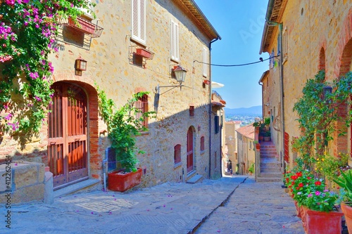 old alley in the village of Castiglione della Pescaia  a famous medieval town overlooking the Tuscan coast in the province of Grosseto  Italy
