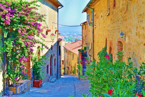old alley in the village of Castiglione della Pescaia, a famous medieval town overlooking the Tuscan coast in the province of Grosseto, Italy