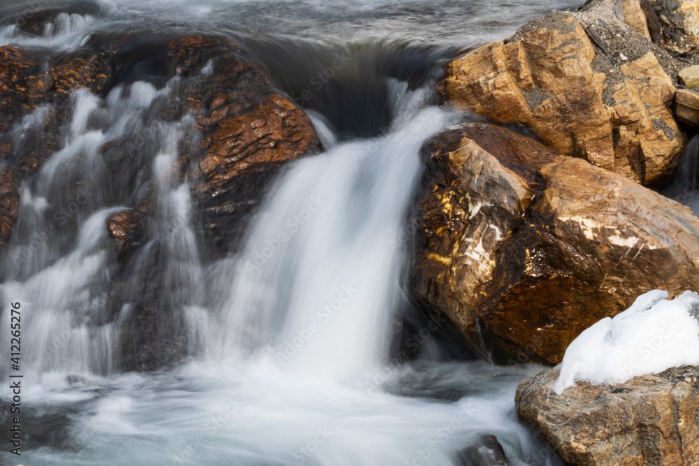 a mountain creek in the spring with water of melting snow, long exposure water photography a mountain creek in the spring with water of melting snow, long exposure water photography