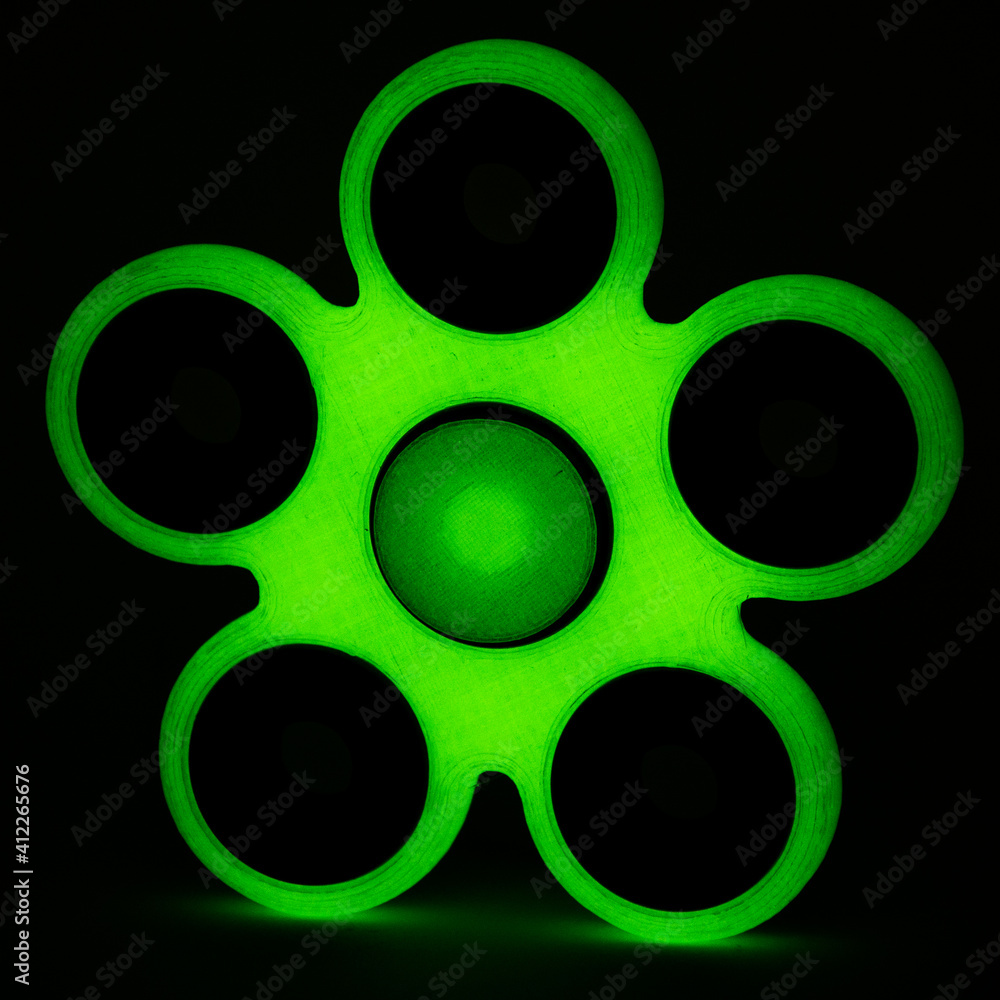 Glowing fidget spinner to relax, relieve stress, play 