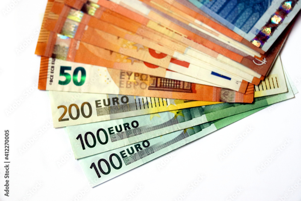 Stack of euro banknotes in white background