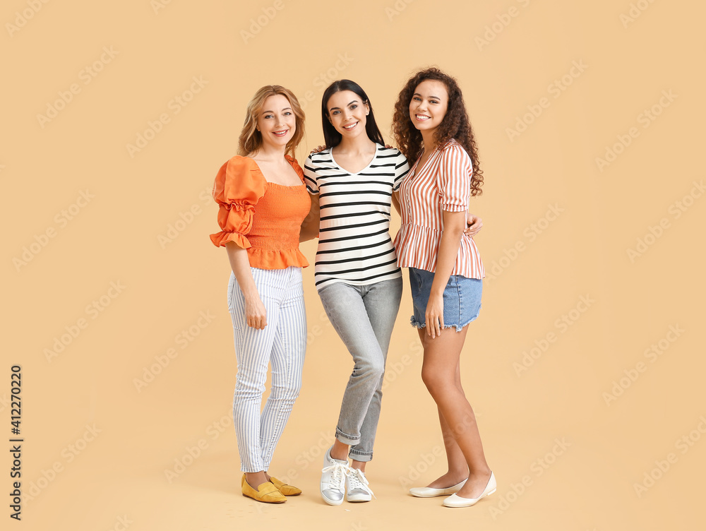 Fototapeta premium Beautiful women on color background. Unity concept