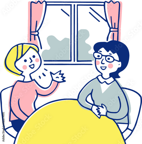 部屋で話す女性2人
