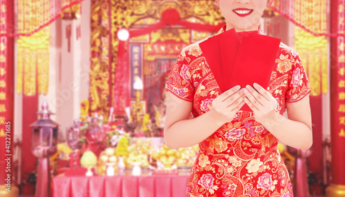 spending money for family in red envelop with Chinese new year festival