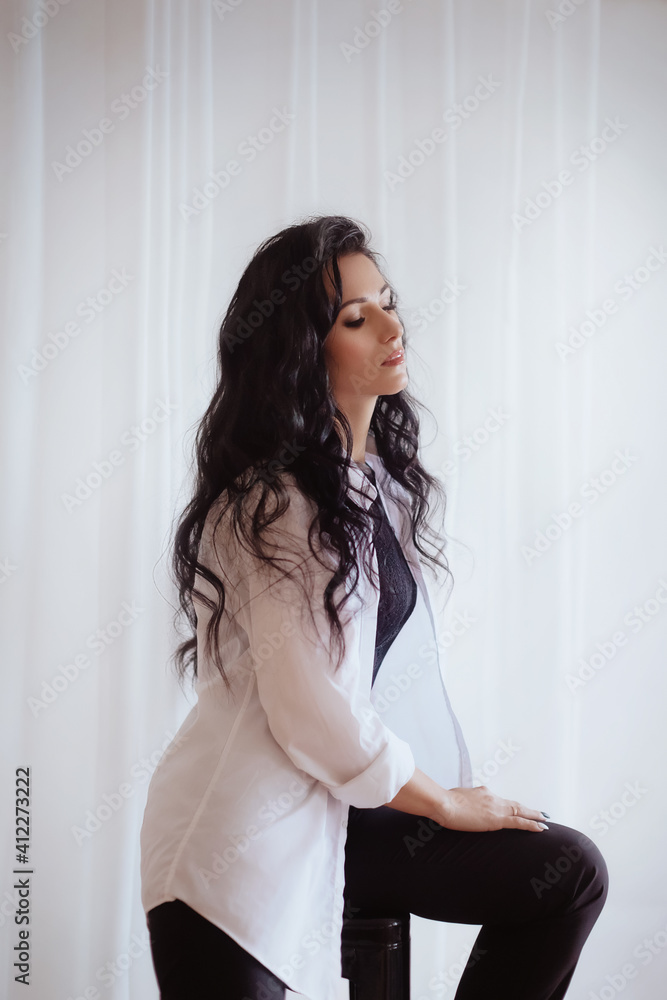 Photo of beautiful young brunette
girl in a casual clothes Photo of beautiful young brunette
girl in a casual clothes