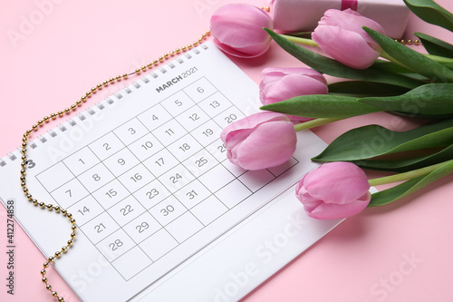 Calendar with flowers on co...