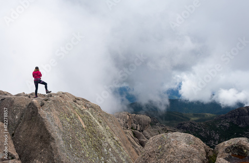 person on the top of mountain in brazil