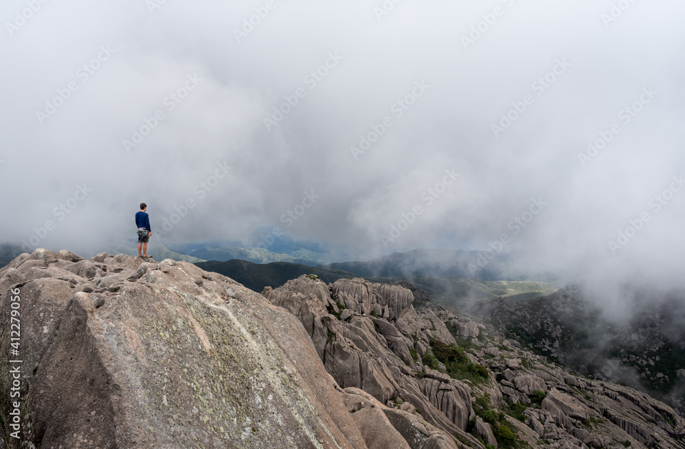 hiker in the foggy mountains
