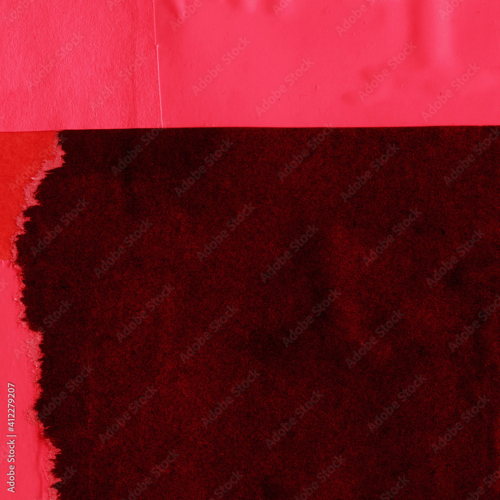 Red and brown torn paper collage close-up. Texture made from various paper and cardboard parts. Damaged old paper background. Vintage blank wallpaper. Material design backdrop.