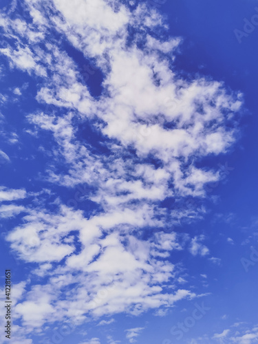 Bright blue sky with beautiful white clouds.