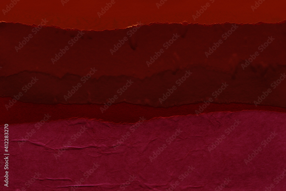 Red and brown torn paper collage close-up. Texture made from various paper and cardboard parts. Damaged old paper background. Vintage blank wallpaper. Material design backdrop. Red and brown torn paper collage close-up. Texture made from various paper and cardboard parts. Damaged old paper background. Vintage blank wallpaper. Material design backdrop.