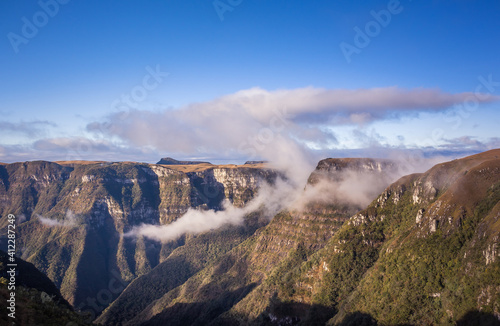 Between the mountains and the valley, we realize how small we are.