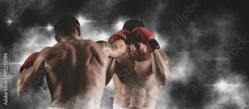 Box professional match on smoke background. Two image of the same model