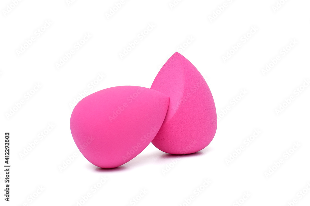Two pink makeup sponges on a white background Two pink makeup sponges on a white background
