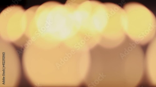 bokeh light-background of luminous candles. 