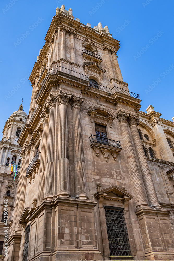 View of North facade of Cathedral of Malaga. Renaissance Cathedral - Roman Catholic Church in the city of Malaga, constructed between 1528 and 1782. Malaga, Costa del Sol, Andalusia, Spain.