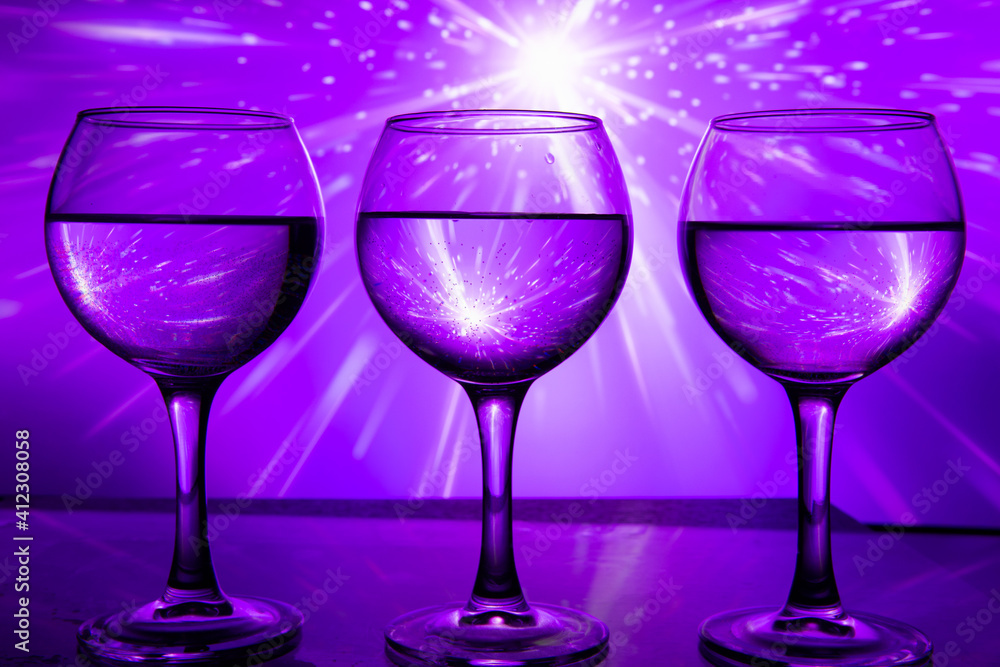 3 glasses of wine in a row on a beautiful background 3 glasses of wine in a row on a beautiful background