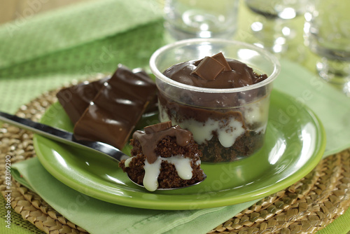 Chocolate flavored pot cake with spoon