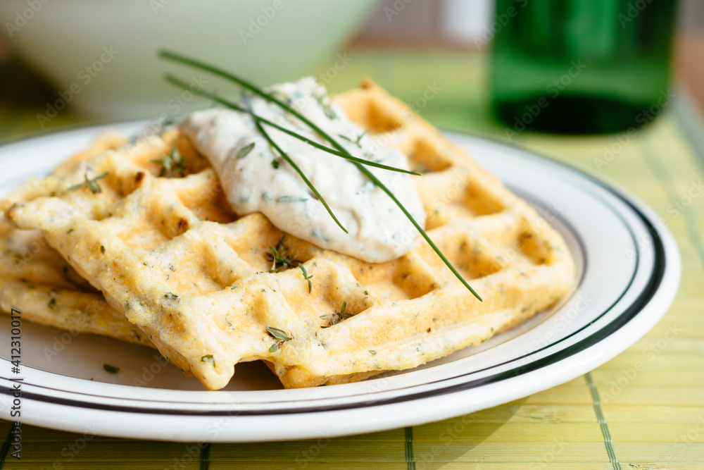 Savory waffles with herbed sauce Savory waffles with herbed sauce