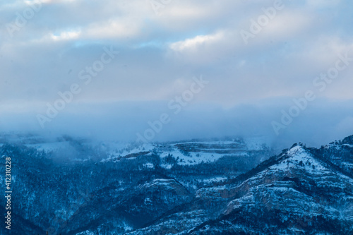 beautiful, big mountains in snow, haze, clouds on a good day, on a trip, travel, holiday, walk, vacation