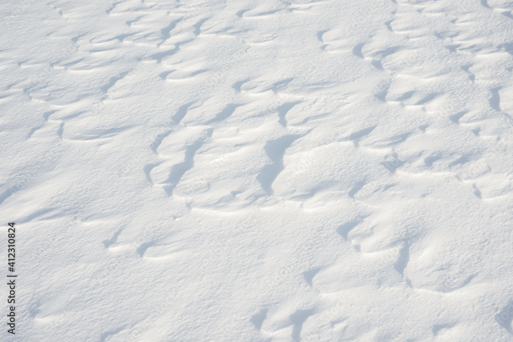 Fresh clean white snow background texture. Winter background with frozen snowflakes and snow mounds. Snow lumps. Seasonal landscape details. Cold weather. Fresh clean white snow background texture. Winter background with frozen snowflakes and snow mounds. Snow lumps. Seasonal landscape details. Cold weather.