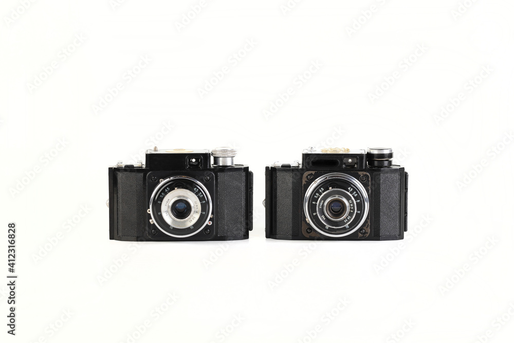 Old 35mm bakelite scaling film camera on white background. Old 35mm bakelite scaling film camera on white background.