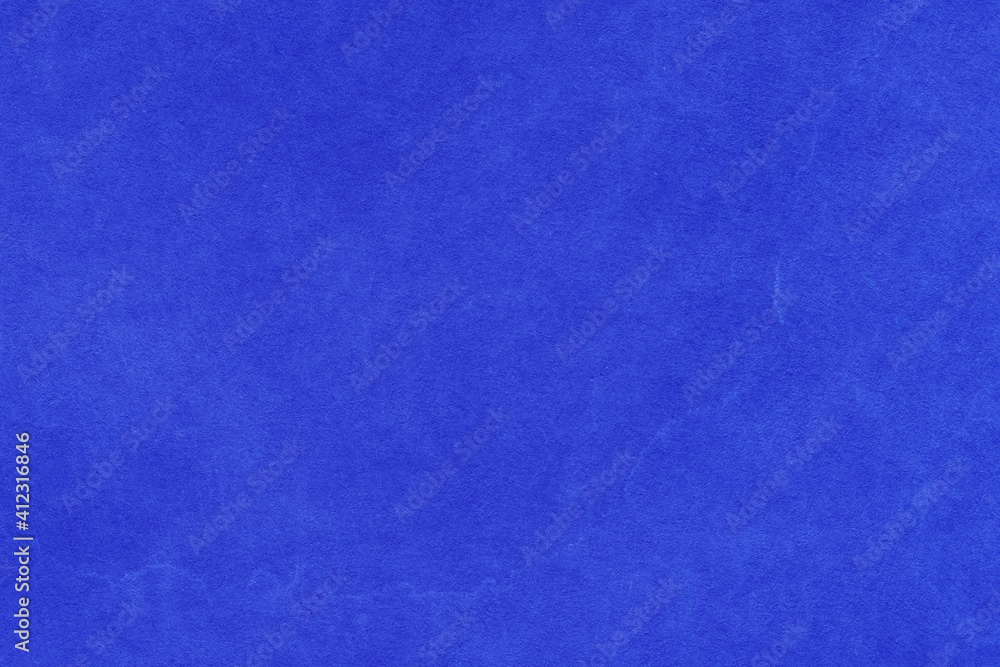 Cardboard blue abstract pattern texture close-up. Retro old paper background. Grunge concrete wall. Vintage blank wallpaper. Cardboard blue abstract pattern texture close-up. Retro old paper background. Grunge concrete wall. Vintage blank wallpaper.