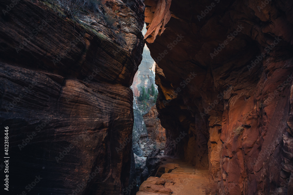 Passageway Through Vibrant Red Rocks at Dusk Passageway Through Vibrant Red Rocks at Dusk