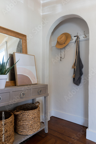 Fototapeta Home entry alcove with side table in neutral colors.