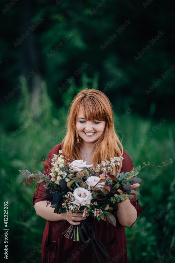 Woman holding beautiful flowers bouquet Woman holding beautiful flowers bouquet