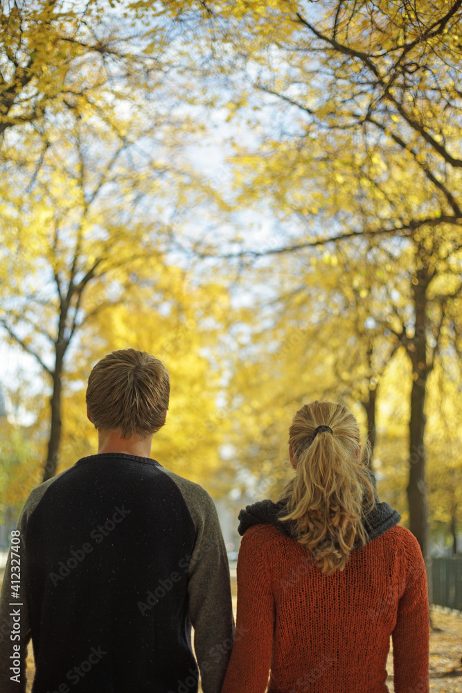 Young couple walking in autumn Young couple walking in autumn