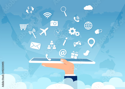 Vector of a hand holding tablet computer with multiple social media app icons