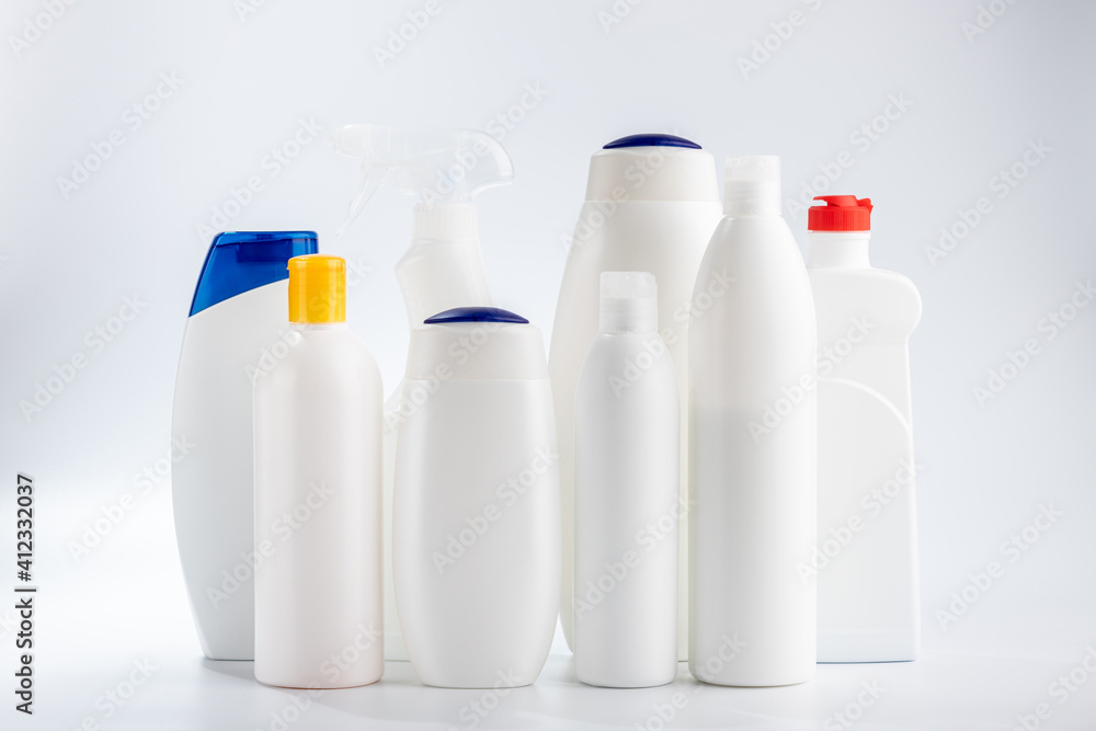 Hair and body cleansers and bathroom and window cleaners. Household chemicals on a white background.