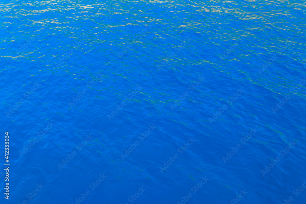 Blue water texture background. Surface of the sea