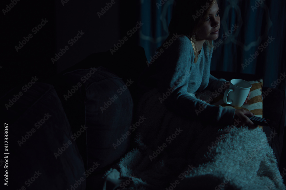 Cropped image of girl with remote Cropped image of girl with remote