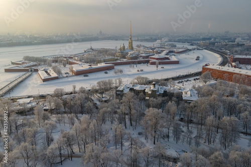 Aerial view of Peter and Pavel's fortress in winter with hoarfrost on the trees, the main destination of Petersburg