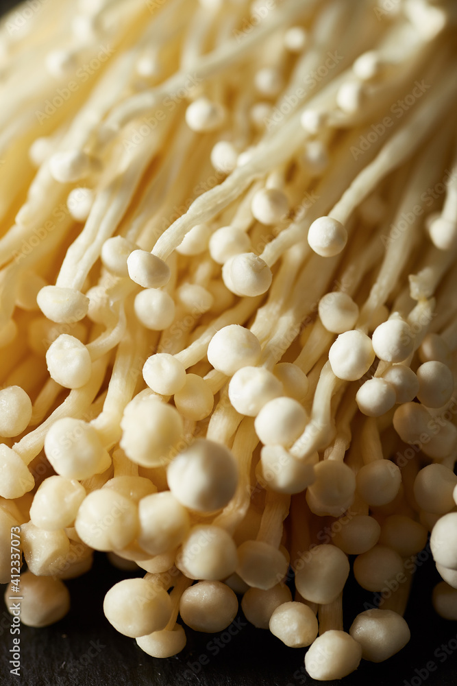 Many white Enoki mushrooms Many white Enoki mushrooms