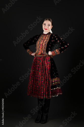 Young beautiful slovak woman in traditional dress. Slovak folklore