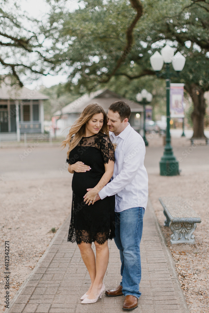 Portrait of a husband & his pregnant wife. Portrait of a husband & his pregnant wife.